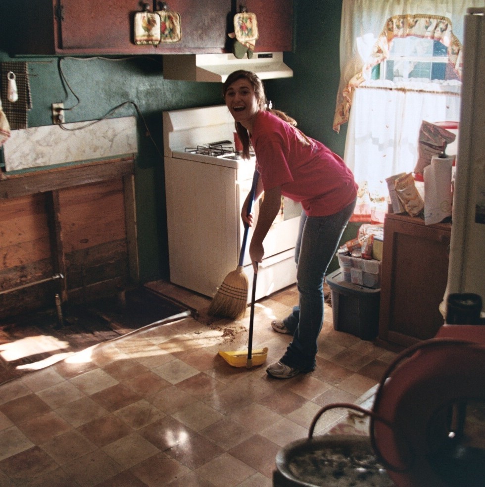 sweeping the kitchen